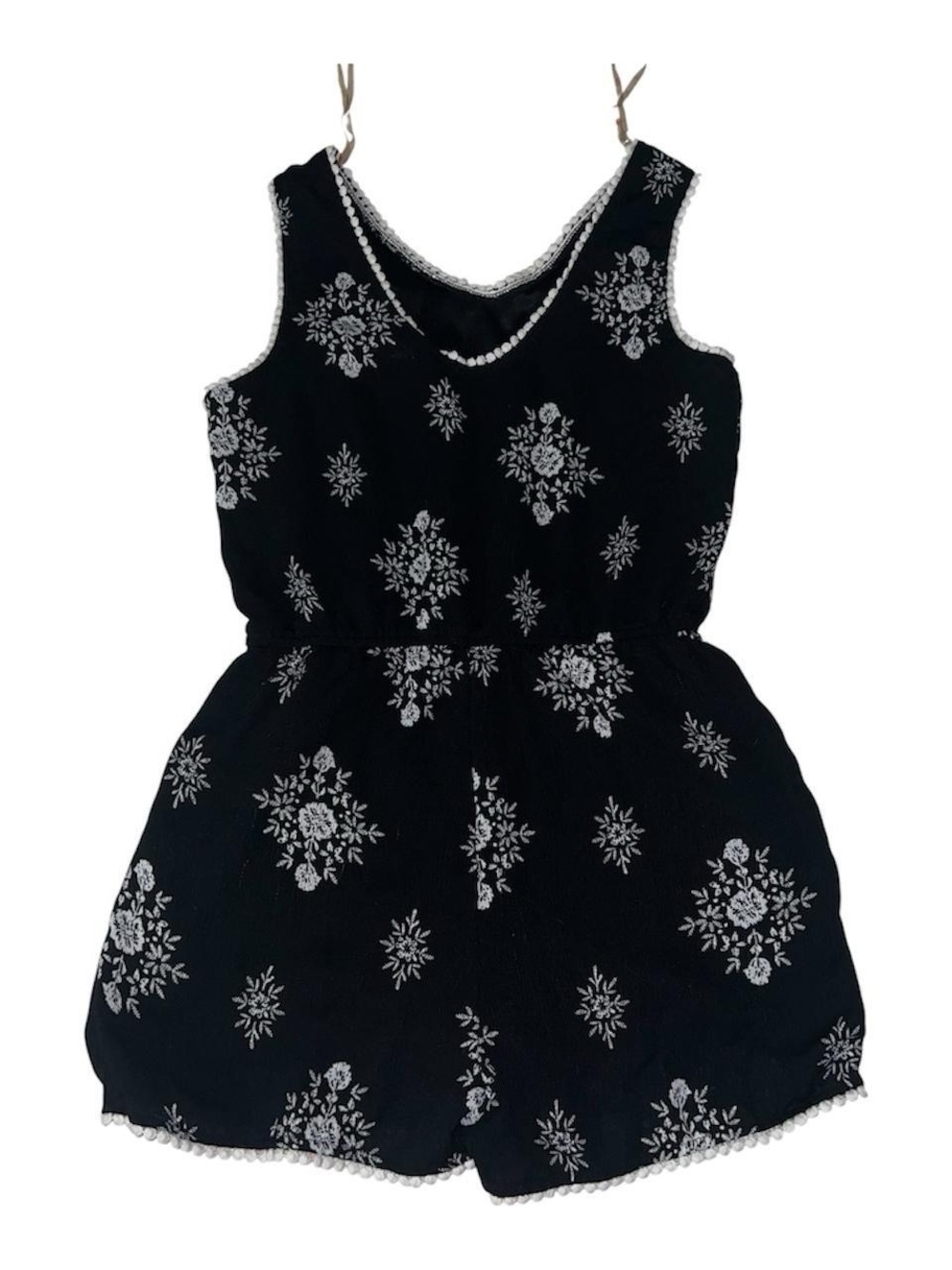 Paper doll girls Black romper with white floral embroidery and trim.
